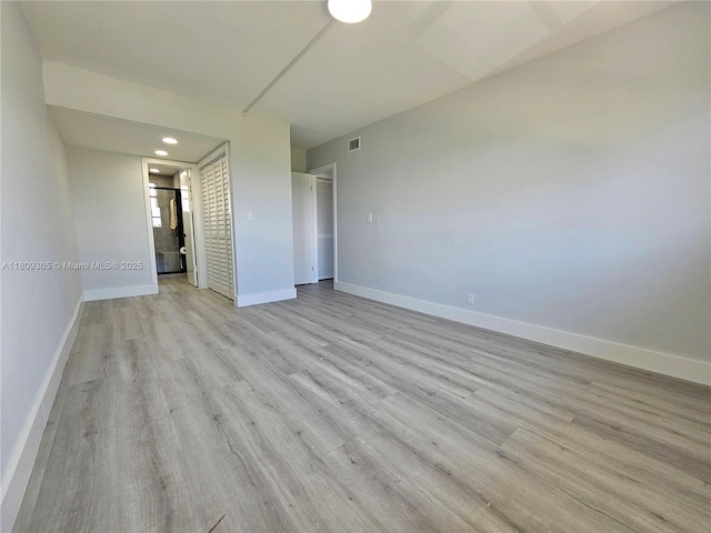 1490 NW 43rd Ave Unit 301, Lauderhill, FL 33313 - empty room featuring light wood-style floors, baseboards, and recessed lighting