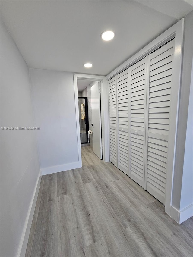 1490 NW 43rd Ave Unit 301, Lauderhill, FL 33313 - hall featuring baseboards, wood finished floors, and recessed lighting