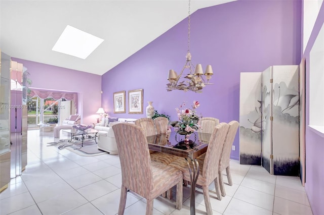 7713 Springwater Pl, Boynton Beach, FL 33437 - dining room featuring high vaulted ceiling, a chandelier, light tile patterned floors, and a skylight