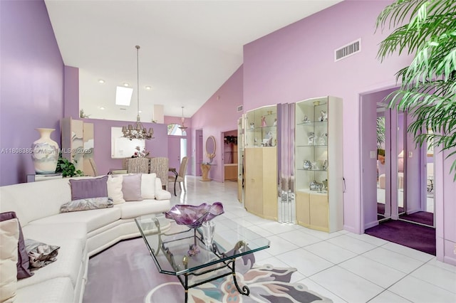 7713 Springwater Pl, Boynton Beach, FL 33437 - living room featuring high vaulted ceiling, a chandelier, and light tile patterned floors
