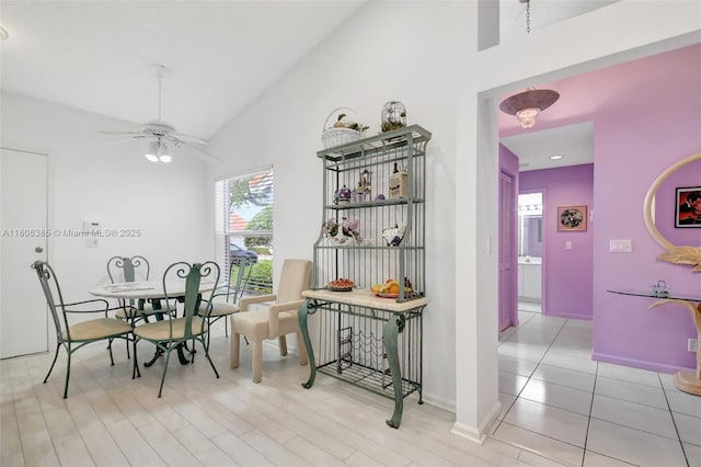 7713 Springwater Pl, Boynton Beach, FL 33437 - dining room featuring ceiling fan, high vaulted ceiling, and baseboards