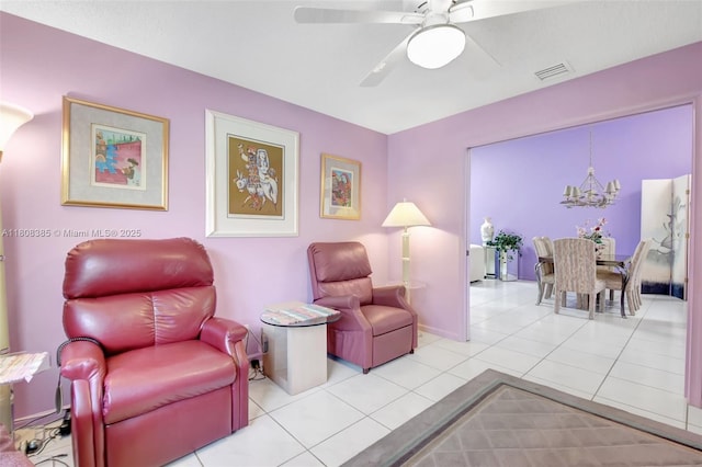 7713 Springwater Pl, Boynton Beach, FL 33437 - sitting room featuring a chandelier, tile patterned floors, and a ceiling fan