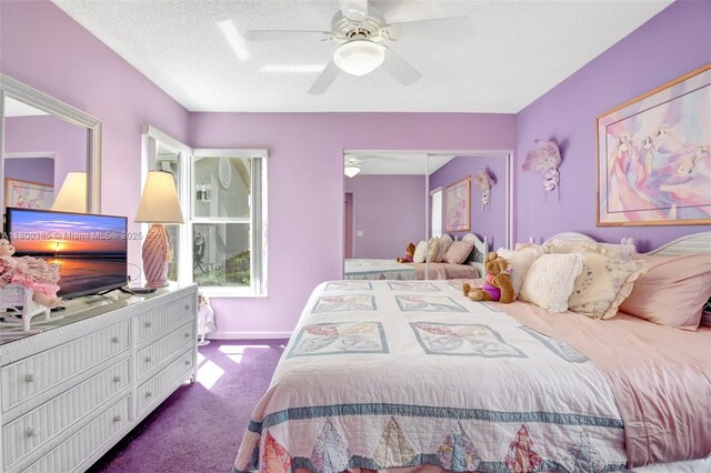 7713 Springwater Pl, Boynton Beach, FL 33437 - bedroom featuring dark carpet, a ceiling fan, baseboards, and a textured ceiling