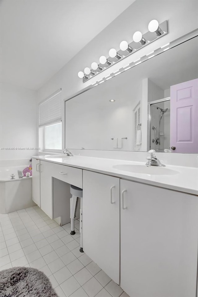 7713 Springwater Pl, Boynton Beach, FL 33437 - bathroom featuring double vanity, a bath, a stall shower, and tile patterned floors