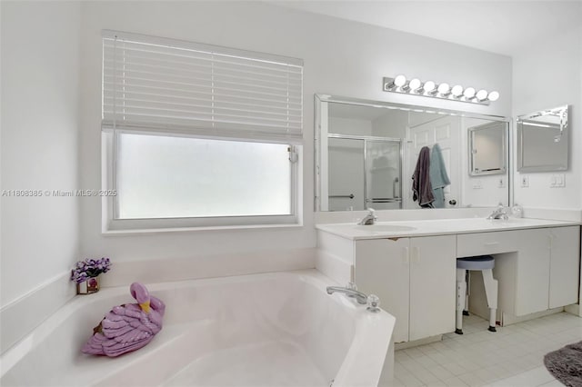 7713 Springwater Pl, Boynton Beach, FL 33437 - bathroom featuring a bath, a stall shower, double vanity, and tile patterned flooring