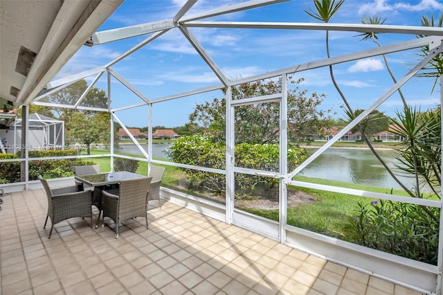 7713 Springwater Pl, Boynton Beach, FL 33437 - sunroom / solarium with a water view and outdoor dining space