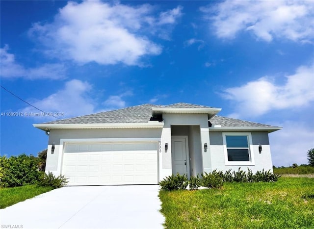 9006 S Castle Cir, La Belle, FL 33935 - prairie-style house featuring concrete driveway, a garage, stucco siding, and a shingled roof