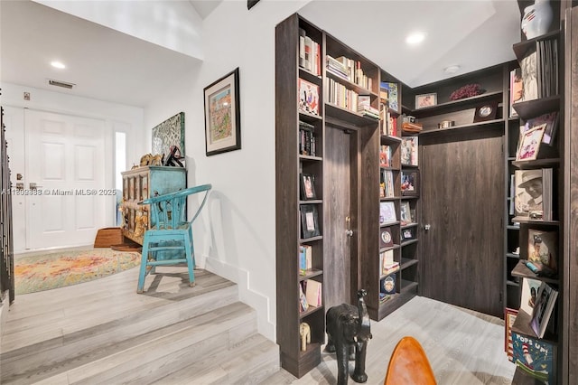 21388 Marina Cove Cir Unit 13-G, Aventura, FL 33180 - living area featuring light wood-type flooring and recessed lighting