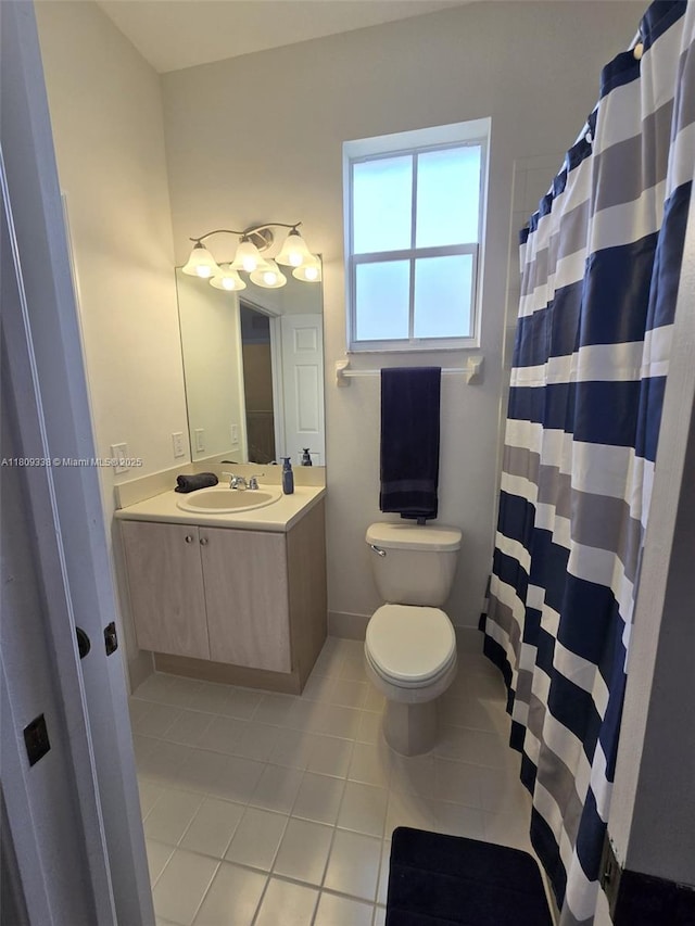 4940 SW 140th Ter Unit 14, Miramar, FL 33027 - bathroom with tile patterned flooring, toilet, and vanity