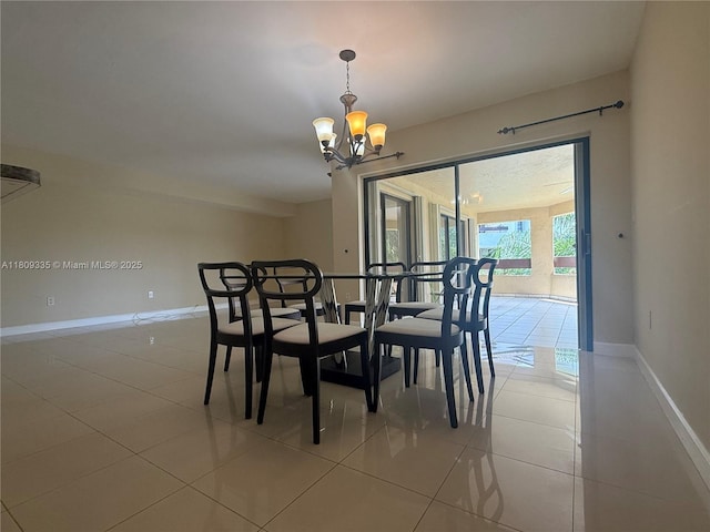 9255 SW 125th Ave Unit 304R, Miami, FL 33186 - dining space featuring a chandelier and light tile patterned flooring