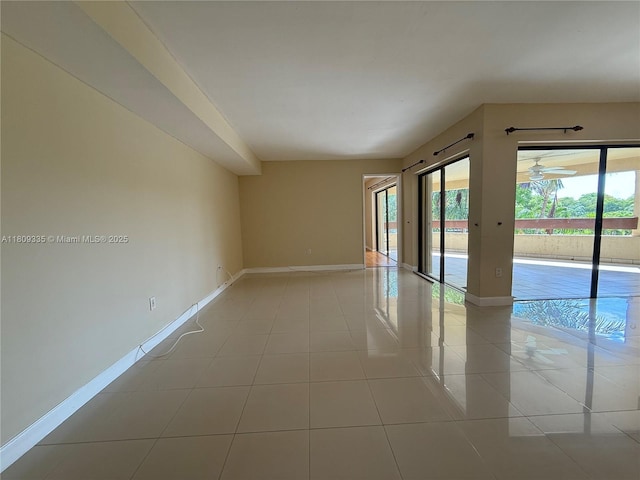 9255 SW 125th Ave Unit 304R, Miami, FL 33186 - spare room featuring ceiling fan and light tile patterned floors