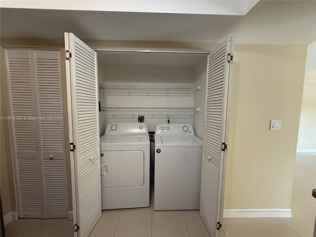 9255 SW 125th Ave Unit 304R, Miami, FL 33186 - laundry room with separate washer and dryer and light tile patterned floors