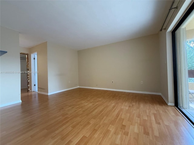 9255 SW 125th Ave Unit 304R, Miami, FL 33186 - empty room featuring light wood-style flooring and baseboards