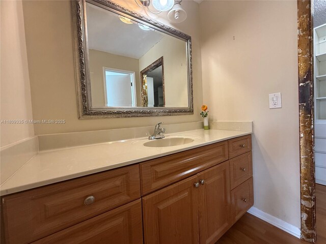 9255 SW 125th Ave Unit 304R, Miami, FL 33186 - bathroom with vanity and wood finished floors