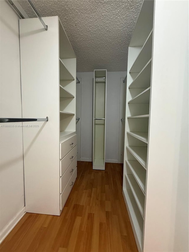9255 SW 125th Ave Unit 304R, Miami, FL 33186 - spacious closet featuring wood finished floors