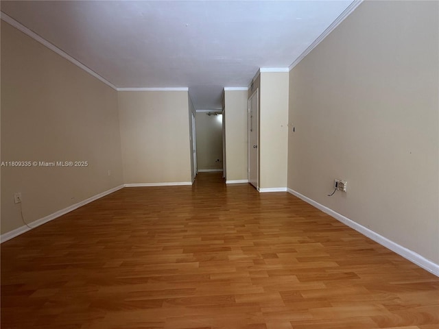 9255 SW 125th Ave Unit 304R, Miami, FL 33186 - spare room with crown molding and light wood-style floors