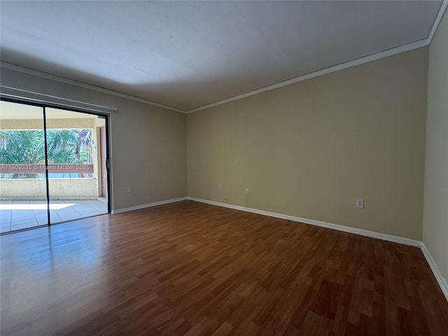 9255 SW 125th Ave Unit 304R, Miami, FL 33186 - spare room featuring crown molding and wood finished floors