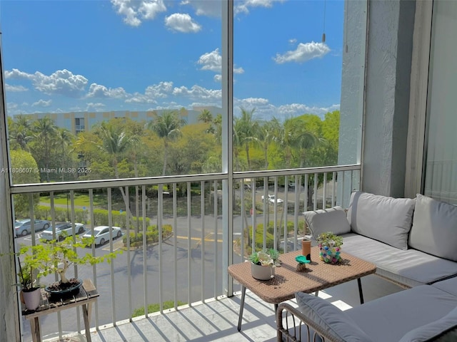 9725 NW 52nd St Unit 421, Doral, FL 33178 - balcony featuring an outdoor living space