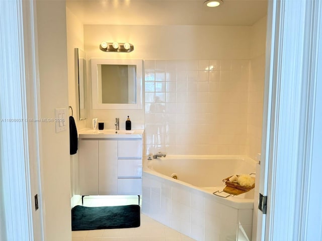 9725 NW 52nd St Unit 421, Doral, FL 33178 - bathroom with a tub with jets, vanity, and tile patterned flooring