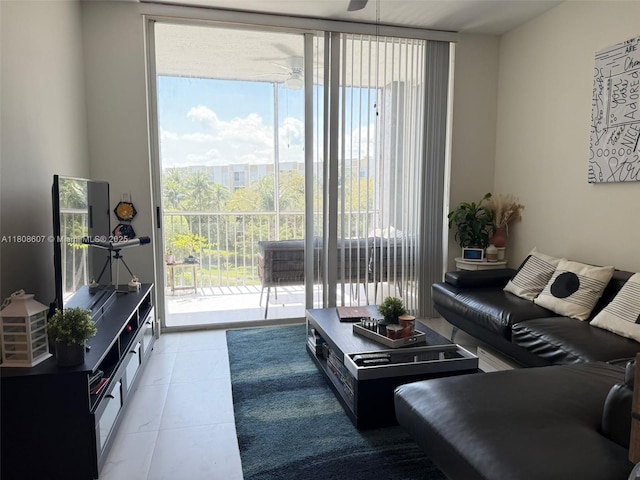 9725 NW 52nd St Unit 421, Doral, FL 33178 - tiled living area featuring a ceiling fan