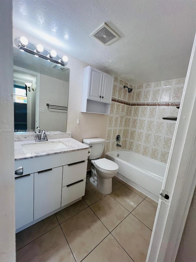606 W 81st St Unit 224, Hialeah, FL 33014 - bathroom with vanity, bathtub / shower combination, toilet, tile patterned floors, and a textured ceiling