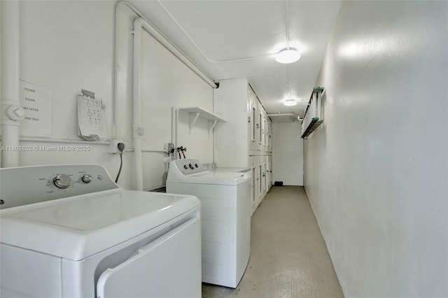 481 Durham Q Unit 481, Deerfield Beach, FL 33442 - laundry area featuring washing machine and dryer and cabinet space