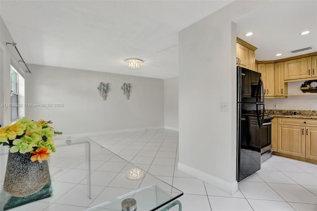 481 Durham Q Unit 481, Deerfield Beach, FL 33442 - kitchen featuring stone countertops, freestanding refrigerator, light tile patterned floors, baseboards, and recessed lighting