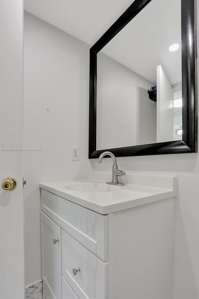 481 Durham Q Unit 481, Deerfield Beach, FL 33442 - bathroom featuring vanity and marble look tiles