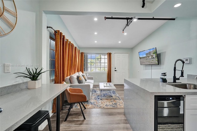 1085 NE 126th St, North Miami Beach, FL 33161 - living room with wood finished floors, recessed lighting, and lofted ceiling