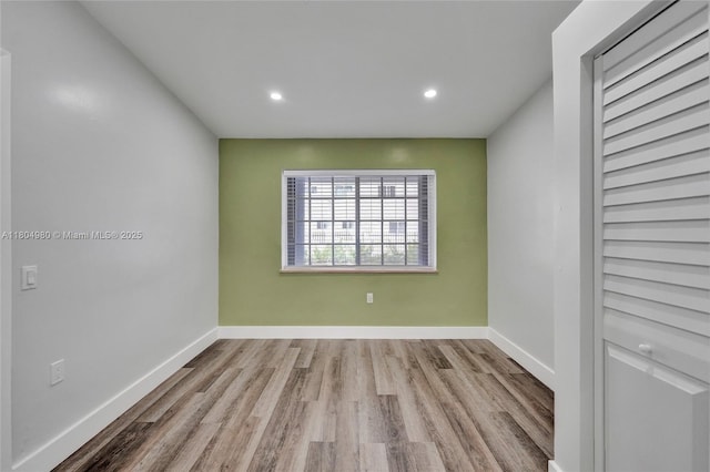 1085 NE 126th St, North Miami Beach, FL 33161 - unfurnished room featuring wood finished floors, recessed lighting, and baseboards