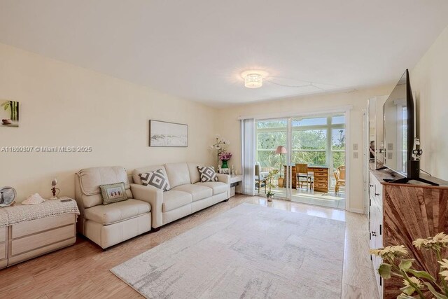 2333 Indian River Blvd Unit 306, Vero Beach, FL 32960 - living area featuring wood finished floors