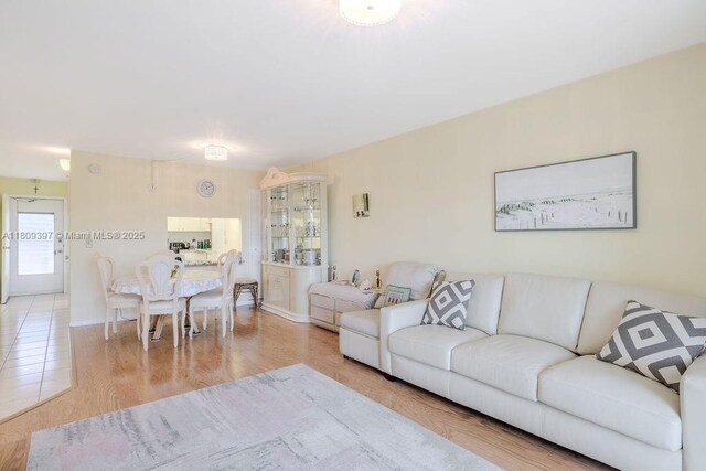 2333 Indian River Blvd Unit 306, Vero Beach, FL 32960 - living room featuring light wood-style flooring