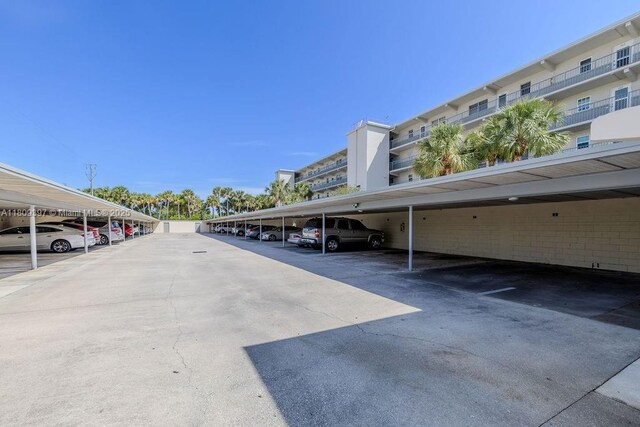 2333 Indian River Blvd Unit 306, Vero Beach, FL 32960 - view of covered parking lot