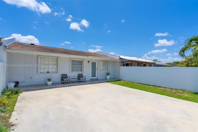 12946 SW 47th Ter, Miami, FL 33175 - view of front of property with brick siding and a patio