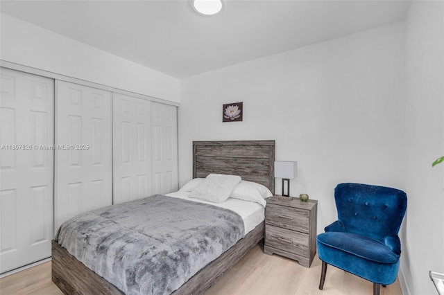 12946 SW 47th Ter, Miami, FL 33175 - bedroom with light wood-type flooring and a closet