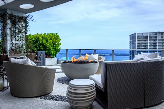 200 Biscayne Boulevard Way Unit 5404, Miami, FL 33131 - balcony featuring a water view and an outdoor fire pit