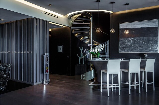200 Biscayne Boulevard Way Unit 5404, Miami, FL 33131 - bar area with stairs, wood finished floors, and hanging light fixtures