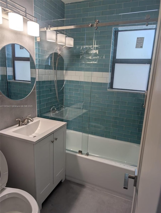 421 SW 11th St, Fort Lauderdale, FL 33315 - full bathroom with toilet, bath / shower combo with glass door, vanity, and tile patterned flooring