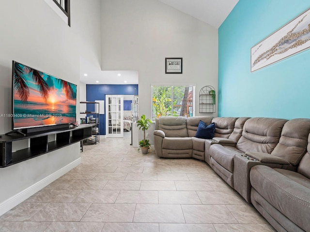 14474 SW 144th Ter, Miami, FL 33186 - living area featuring high vaulted ceiling, baseboards, and french doors