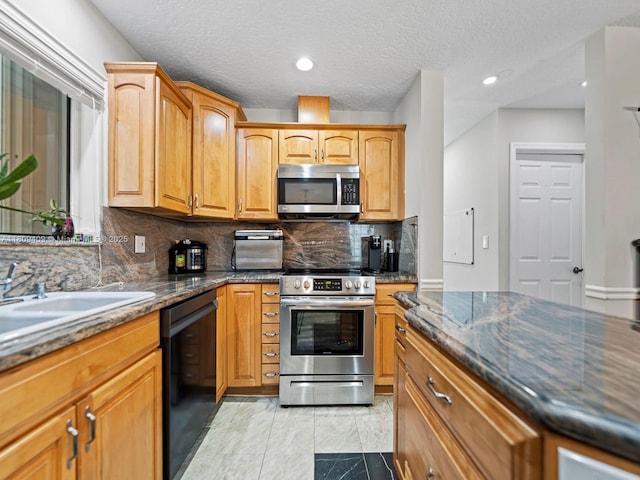 14474 SW 144th Ter, Miami, FL 33186 - kitchen featuring stainless steel appliances, tasteful backsplash, dark stone countertops, light marble finish flooring, and recessed lighting