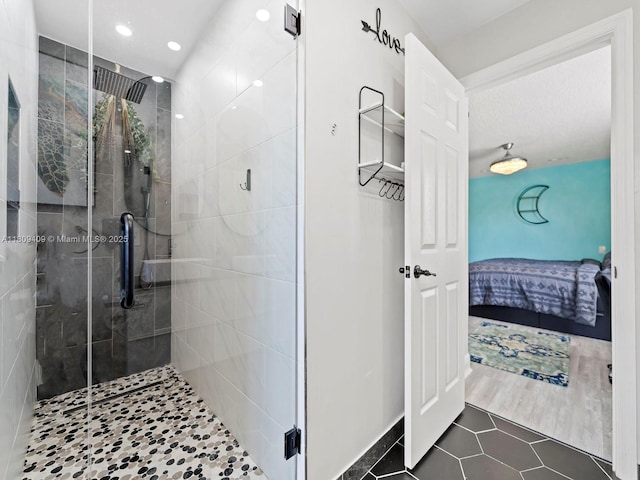 14474 SW 144th Ter, Miami, FL 33186 - full bathroom with connected bathroom, tile patterned flooring, a stall shower, and recessed lighting