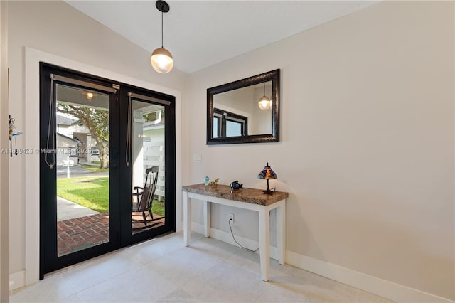 14912 SW 139th Ave, Miami, FL 33186 - entrance foyer with baseboards, vaulted ceiling, french doors, and light tile patterned floors