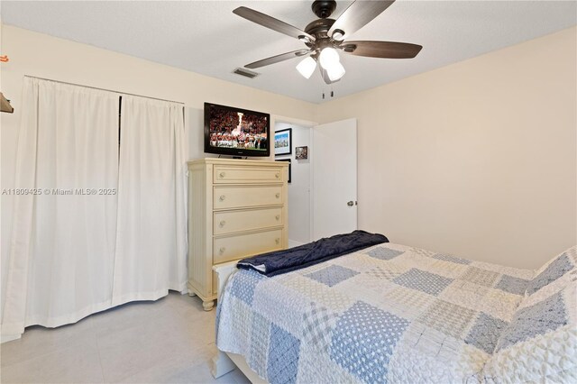 14912 SW 139th Ave, Miami, FL 33186 - bedroom featuring a ceiling fan and light tile patterned floors