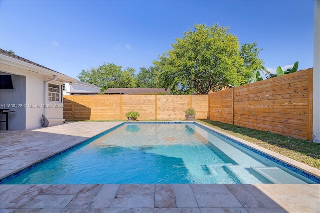 14912 SW 139th Ave, Miami, FL 33186 - view of swimming pool with a patio area and a fenced backyard