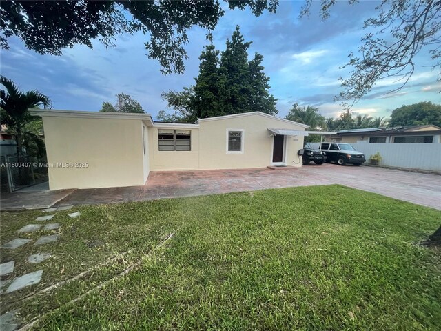 18201 NW 4th Ave, Miami Gardens, FL 33169 - rear view of property featuring stucco siding and a patio area