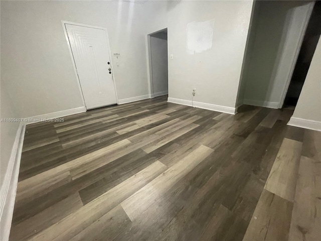 18201 NW 4th Ave, Miami Gardens, FL 33169 - spare room with baseboards and dark wood-style floors