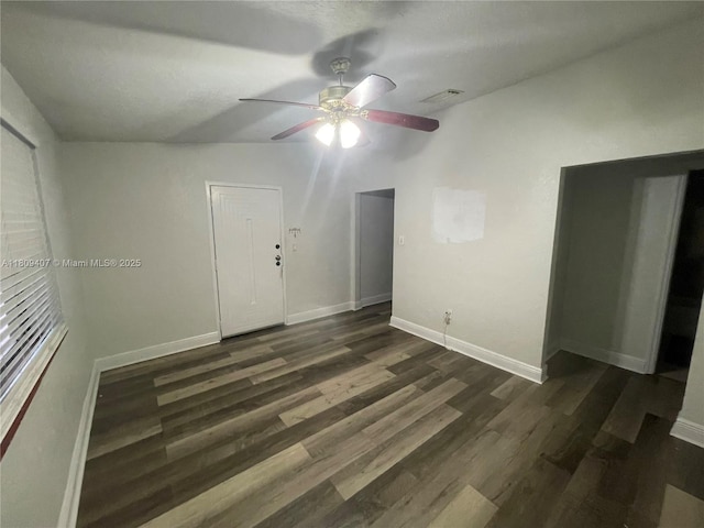 18201 NW 4th Ave, Miami Gardens, FL 33169 - spare room featuring ceiling fan, dark wood-type flooring, and baseboards