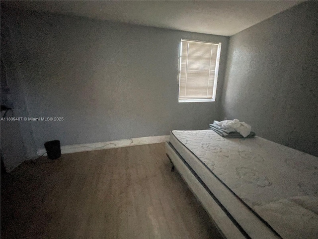18201 NW 4th Ave, Miami Gardens, FL 33169 - unfurnished bedroom with wood finished floors and baseboards