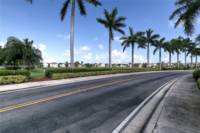 1270 Weeping Willow Way, Hollywood, FL 33019 - view of asphalt road with sidewalks and curbs
