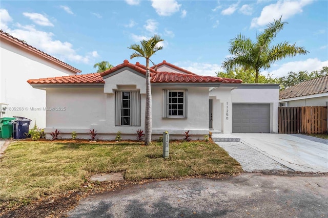 11250 SW 157th Ct, Miami, FL 33196 - mediterranean / spanish-style home with a garage, driveway, stucco siding, and a tiled roof